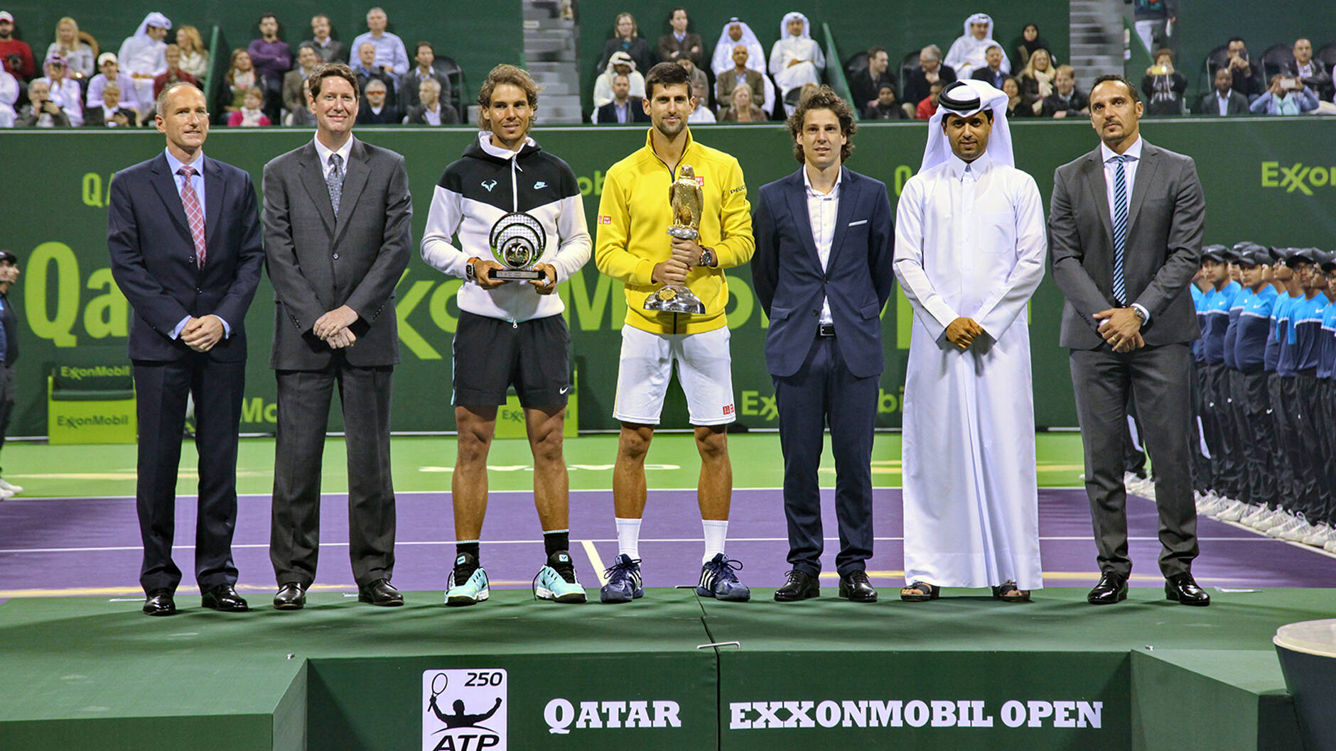 Qatar ExxonMobil Open 2016 champion Novak Djokovic of Serbia and second-place finisher Rafael Nadal of Spain with Alistair Routledge, President and General Manager for ExxonMobil Qatar; Andrew P. Swiger, Senior Vice President of Exxon Mobil Corporation; H.E. Nasser Al-Khelaifi, President of Qatar Tennis Federation and other dignitaries at the prize giving ceremony.